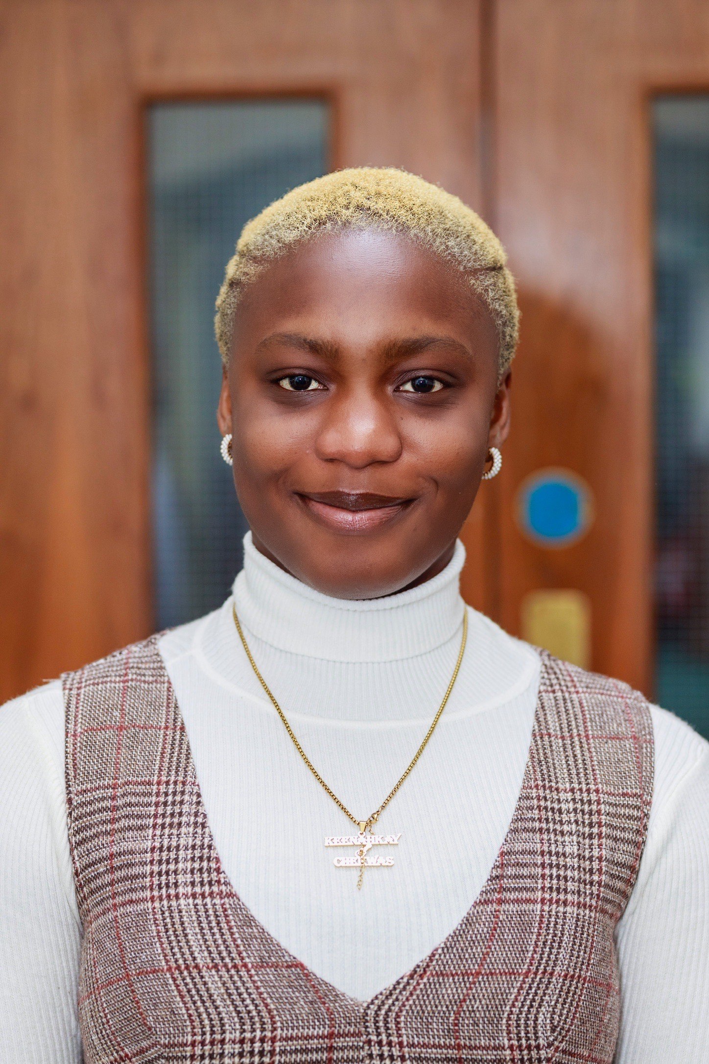 Headshot of Oyinkansola Onwuchekwa.