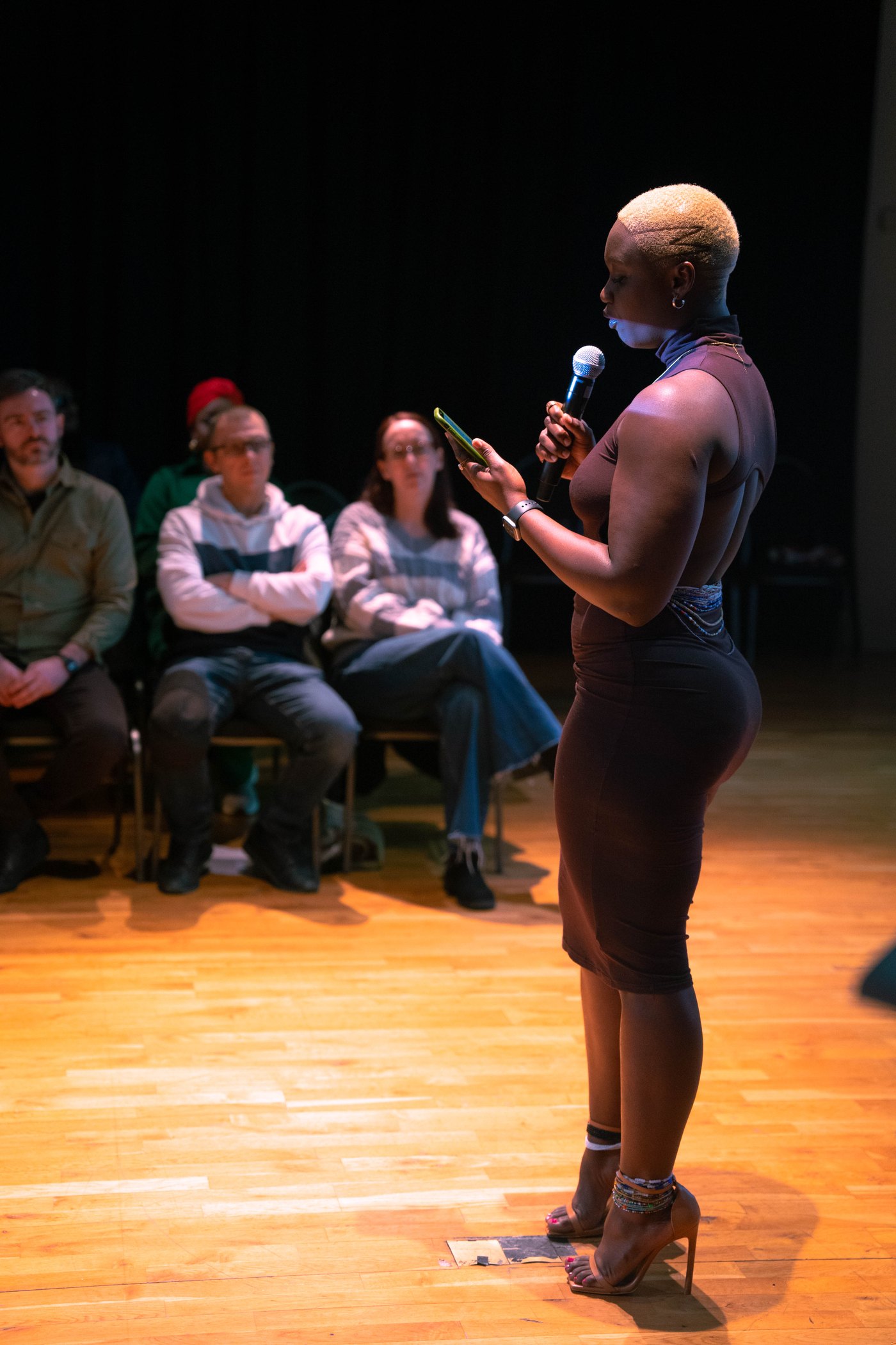 Oyinkansola Onwuchekwa speaking to an audience.